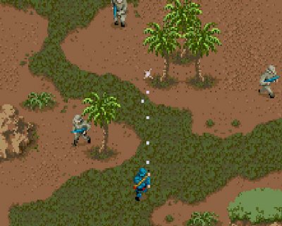 Στιγμιότυπο παιχνιδιού Commando που απεικονίζει έναν στρατιώτη να πολεμά σε ένα έρημο περιβάλλον.