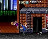 Double dragon gameplay screenshot featuring featuring two characters fighting in a back alley.