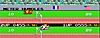  Track and Field – Gameplay-Screenshot mit zwei Sportlern, die im 200-Meter-Hürdenlauf antreten