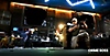 Crime Boss: Rockay City - Istantanea della schermata che mostra un criminale che si mette al riparo da raffiche di proiettili