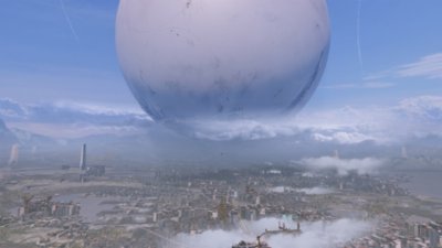 Captura de pantalla de Destiny 2 que muestra al Viajero sobrevolando la Última Ciudad de la Tierra