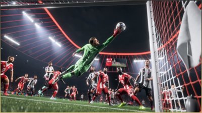 EA SPORTS FC 26 screenshot showing a goalkeeper diving to save a shot