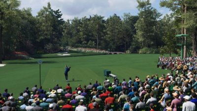 EA SPORTS PGA Tour 23 screenshot for Ball Behaviour page section showing the crowd watching a golfer swinging their club on the fairway.