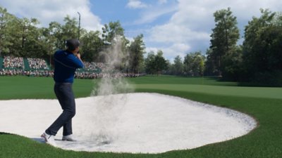Capture d'écran d'EA Sports PGA Tour 23 montrant un joueur qui frappe la balle hors d'une fosse de sable