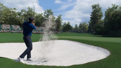 EA Sports PGA Tour 23 - Capture d'écran mettant en scène un joueur qui frappe une balle depuis un bunker