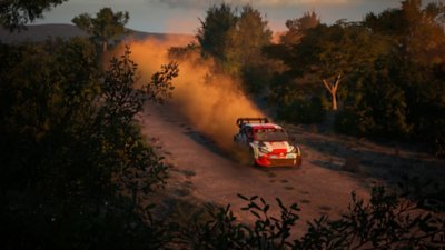 Arte guía de EA Sports WRC que muestra un Toyota GR YARIS Rally1 HYBRID corriendo por una pista forestal de tierra