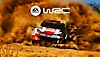EA Sports WRC-nøglegrafik af en Toyota GR YARIS Rally1 HYBRID, der hvirvler sand op i luften på en sandstøvet bane