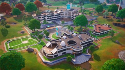 Captura de ecrã do Fortnite Chapter 6 Season 3 com uma vista aérea dos edifícios futuristas