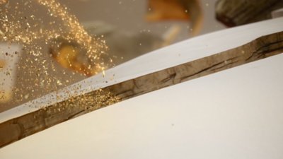 fondo animado con detalles dorados en consola PS5