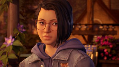 Life Is Strange True Colors snimak ekrana koji prikazuje glavnu junakinju Aleks Čen