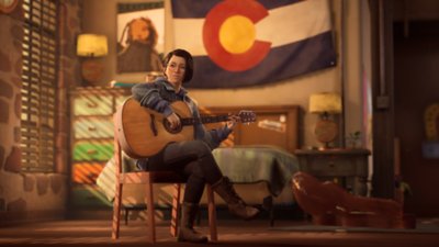 Life Is Strange True Colors screenshot showing Alex, the main character playing an acoustic guitar