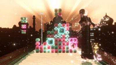 Lumines Arise screenshot showing gameplay with a background showing a Taj Mahal-like structure