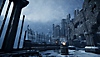 Captura de pantalla de Metal: Hellsinger con un entorno cubierto de nieve similar a una fortaleza.