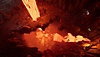 Captura de pantalla de Metal Hellsinger con una grieta hirviendo llena de lava fundida.