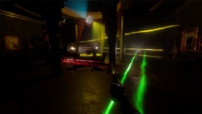 A short video of a shootout between multiple characters in a large room lit by a disco ball.