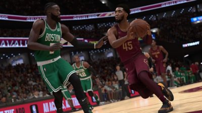 NBA 2K24 screenshot showing a Cleveland player taking on a Boston player.