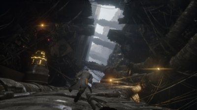 Saros screenshot showing Arjun running through a gray industrial structure
