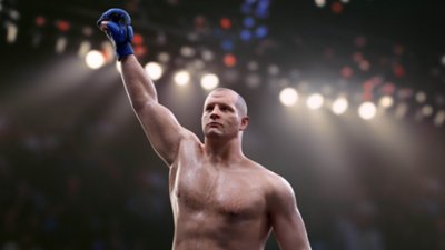 Captura de pantalla de UFC 5 que muestra a Fedor Emelianenko levantando el puño con el guante alzado