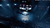 Captura de pantalla de UFC 5 que muestra un ring repleto de gente alrededor