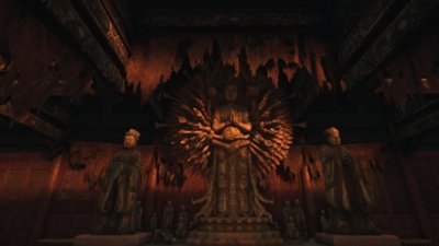 Képernyőkép a Wuchang: Fallen Feathers játékból, amelyen számos szobor látható, köztük az egyik Avaloketishvarát, az ezerkarú bodhisattvát ábrázolja középen.