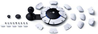 Contenido de la caja del mando Access que muestra los botones y las almohadillas de joystick intercambiables