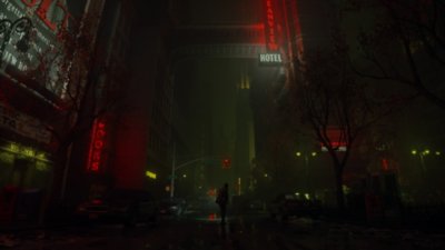 《Alan Wake 2》螢幕截圖，呈現艾倫·韋克站在「黑暗深處」像紐約市的街道中央