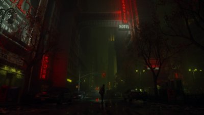 Alan Wake 2 - Istantanea della schermata che mostra Alan Wake nel Luogo buio, in piedi nel mezzo di una strada che ricorda quelle di New York