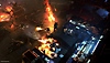 《Aliens:Dark Descent》螢幕截圖，展示角色對外星人發射火焰噴射器