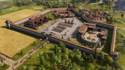 Anno 117: Pax Romana — kuvakaappauksessa näkyy ylhäältä kuvattuna kasarmirakennus, jonka sisällä on sotilaita muodostelmassa 