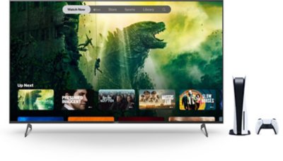 Image d'une télévision affichant le menu de l'application Apple TV, avec une PS5 (debout) et une manette DualSense à côté