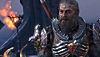 Captura de ecrã do Baldur's Gate 3 com um homem de barbas e armadura em frente a um candeeiro.