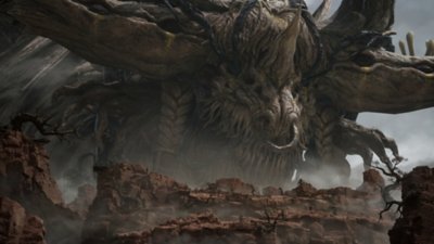 Ballad of Antara – snímek obrazovky zobrazující obrovskou démonickou bytost s kroužkem v nose, která se tyčí nad krajinou