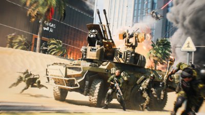 Capture d'écran de Battlefield 2042 montrant des spécialistes s'abritant derrière un véhicule blindé.