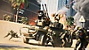 Captura de pantalla de Battlefield 2042 con especialistas cubriéndose detrás de un vehículo blindado