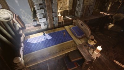 Captura de pantalla de Brothers: A Tale of Two Sons Remake que muestra a los personajes en una cama gigante