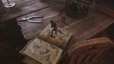 Brothers: A Tale of Two Sons Remake screenshot showing a giant desk