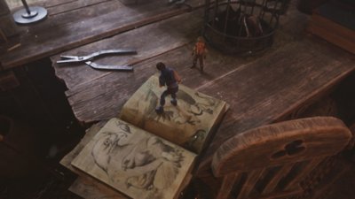 Captura de pantalla de Brothers: A Tale of Two Sons Remake que muestra un escritorio gigante