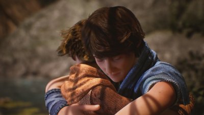 Captura de pantalla de Brothers: A Tale of Two Sons Remake que muestra a los dos hermanos abrazándose