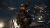 Call of Duty: Modern Warfare III – Screenshot, der Ghost in Militärkleidung zeigt, wie er ganz oben auf einem Industriegebäude steht