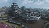 Call of Duty: Warzone ekran görüntüsü, yeni Ashika Adası Resurgence haritasındaki Japon tarzı binaları gösteriyor