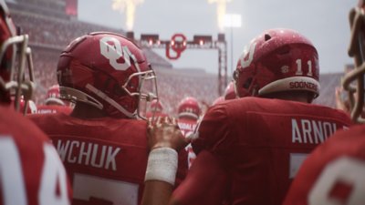 EA Sports College Football 25 – posnetek zaslona kaže domačo ekipo, ki se odpravi na igrišče