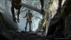 《往日不再》游戏截屏，展示主角Deacon St. John站在被雾气覆盖的森林中，前景有悬挂的尸体。