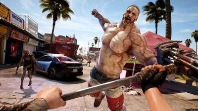 Dead Island 2 screenshot showing the player swinging a sledgehammer at a muscular zombie