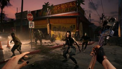 Captură de ecran din Dead Island 2 prezentând o hoardă de zombi atacând un jucător care agită o cheie franceză