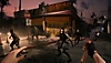 Dead Island 2 screenshot showing a horde of zombies attacking a wrench-wielding player