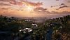 Snímek obrazovky ze hry Dead Island 2 zachycující Beverly Hills za soumraku.