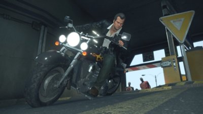 Dead Rising Deluxe Remaster screenshot showing Frank riding a motorcycle