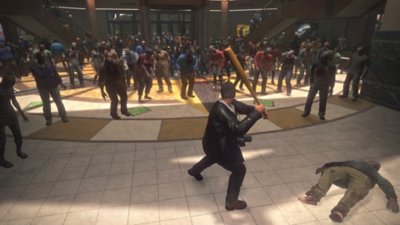 Dead Rising Deluxe Remaster screenshot showing Frank swinging a baseball bat in front of a horde of zombies