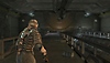 Dead Space – Illustration de la version originale montrant Isaac qui marche vers un grand hangar