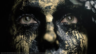 Death Stranding 2: On the Beach screenshot showing someone's nose and eyes up close with their face covered in a black substance
